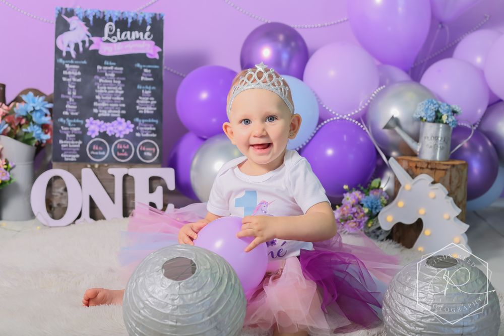 cake smash indoor. floral unicorn theme.