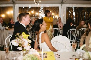 Wedding reception under string lights with elegant table settings and floral centerpieces. Best wedding photographer in Adelaide SA
