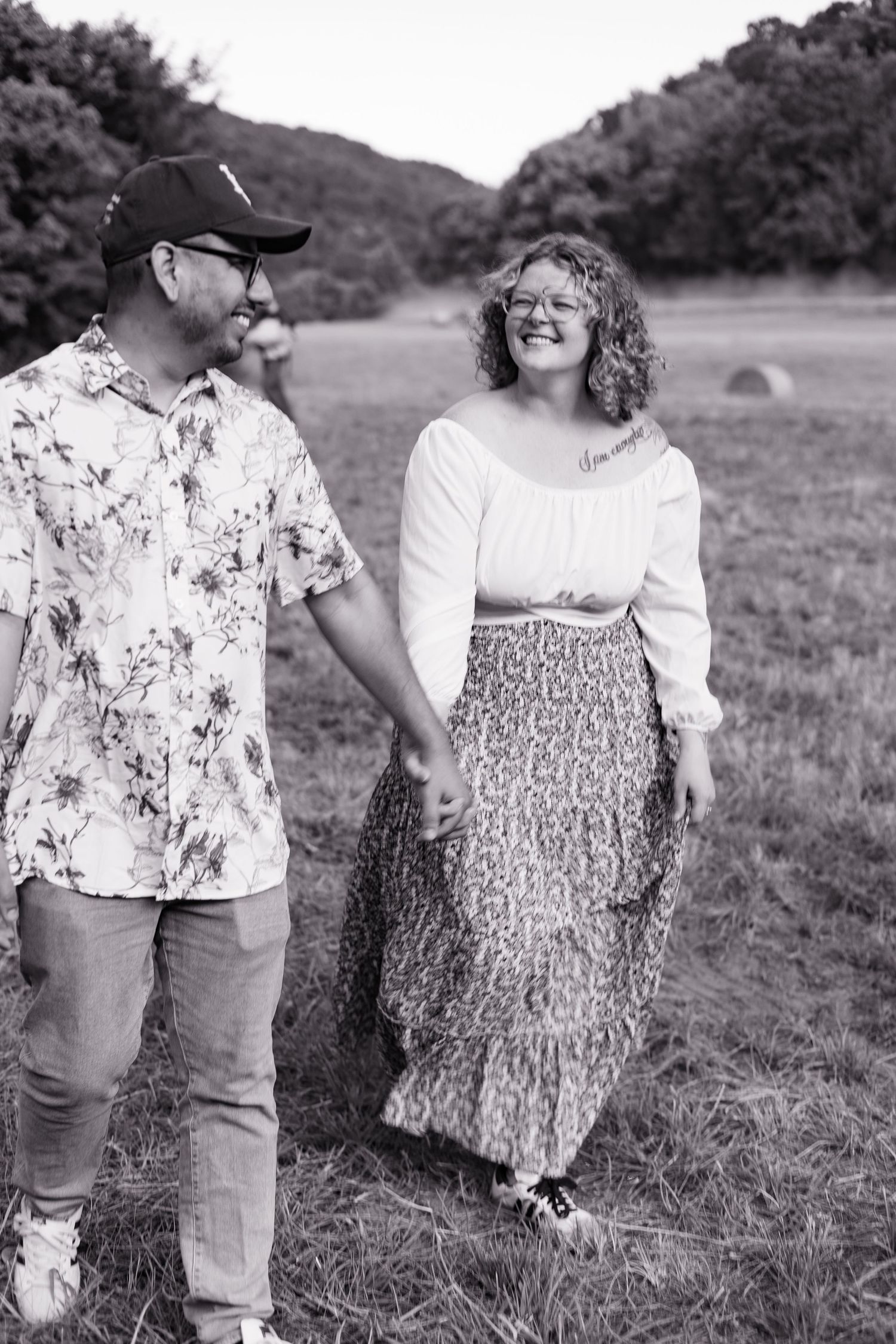 buffalo river engagement session steel creek Ponca arkansas couple walking and laughing