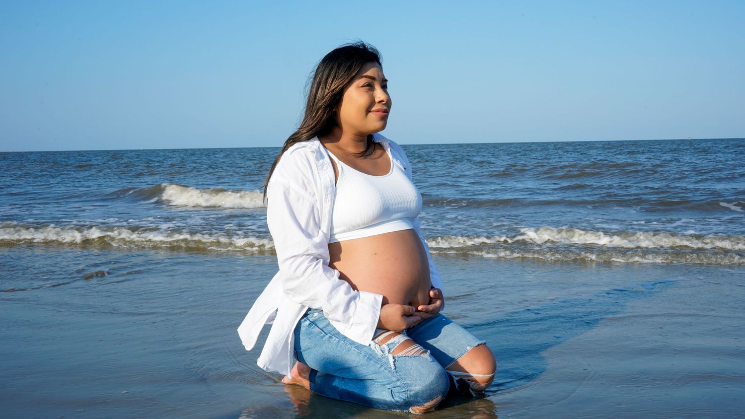 Maternity photo shoot at Driftwood Beach, Jekyll Island, Georgia.