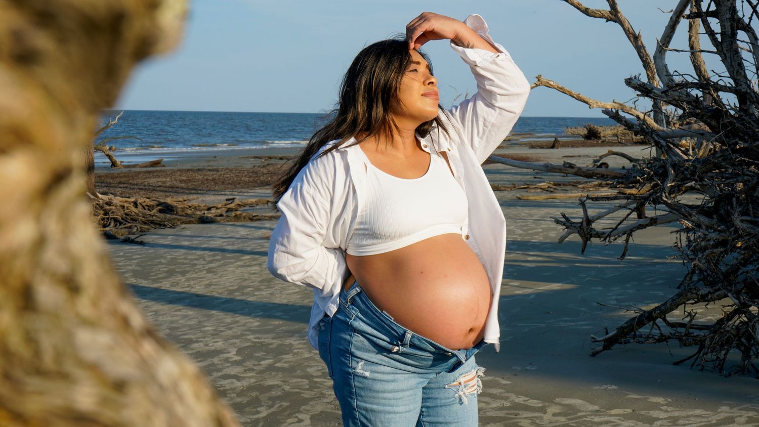 Maternity photo shoot at Driftwood Beach, Jekyll Island, Georgia.