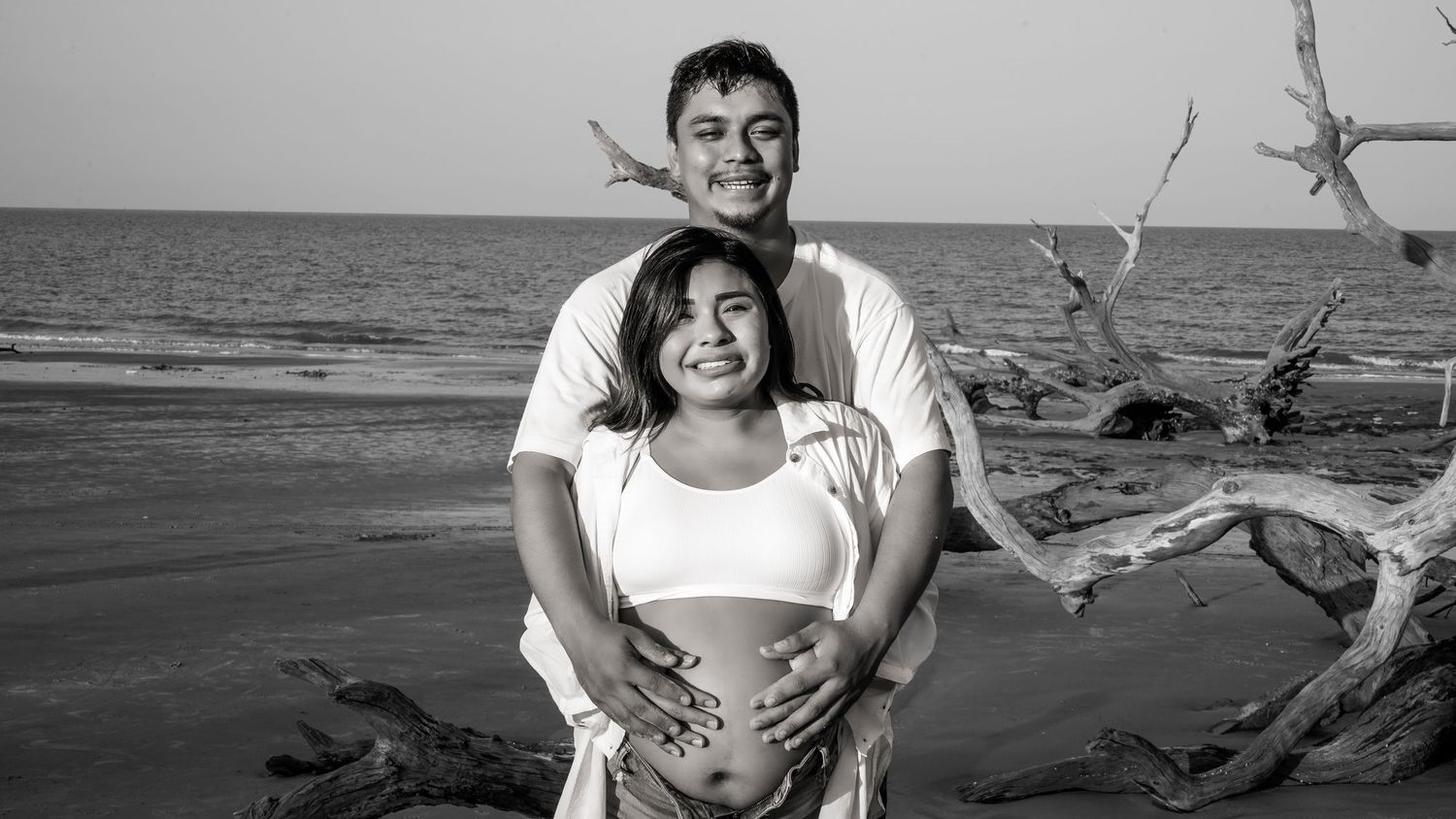 Maternity photo shoot at Driftwood Beach, Jekyll Island, Georgia.