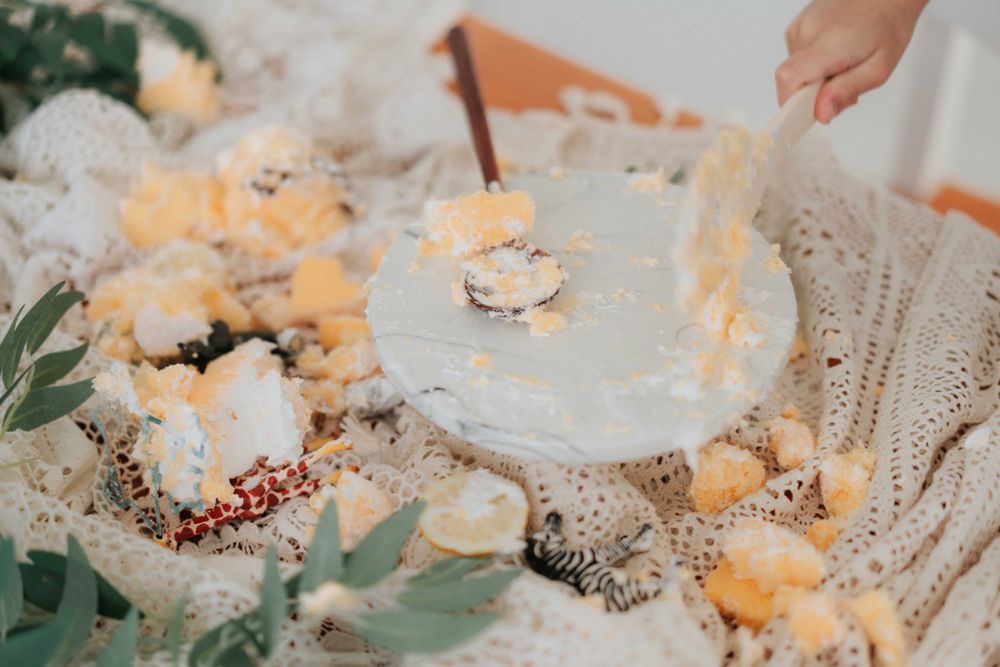 Close-up of a decorated party table with glowing lights and delicate details.