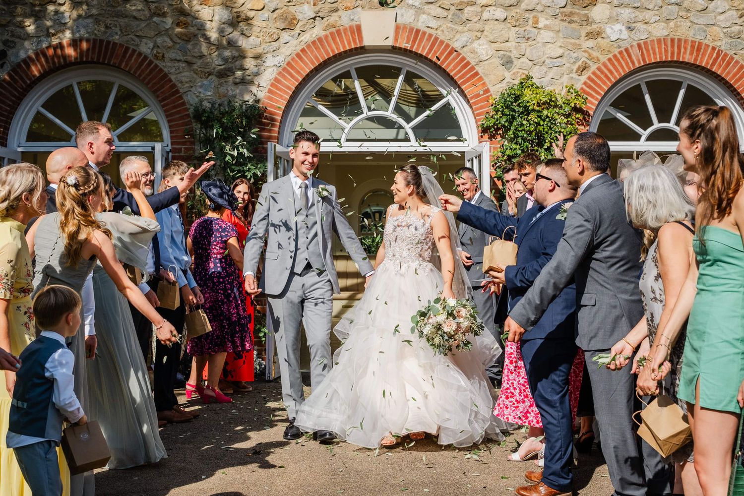 Wedding photograph at The Orangery In Maidstone Kent confetti