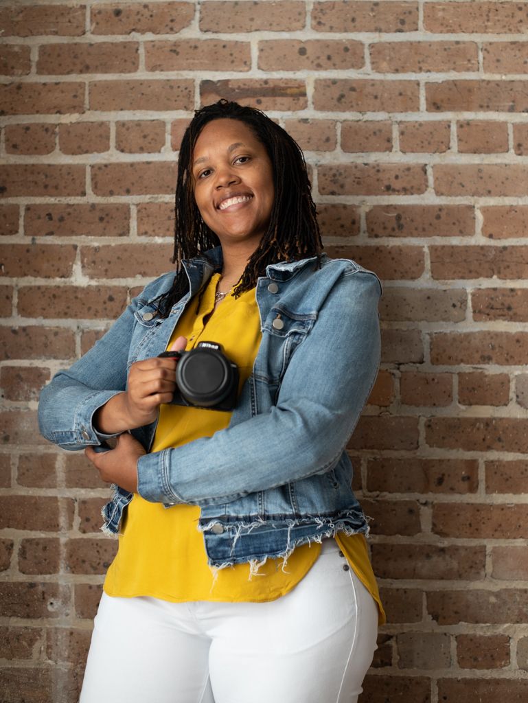 Jasmine with a camera in hand