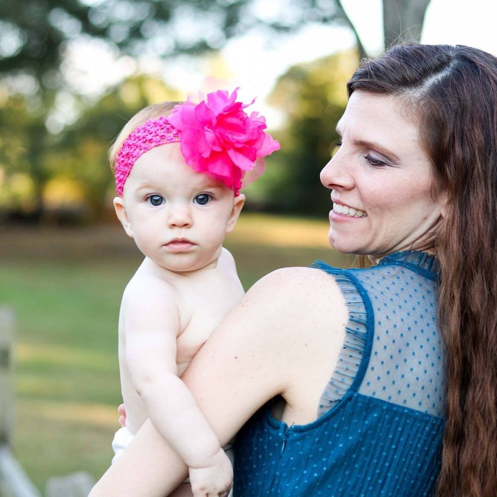 mom and baby girl portrait in downtown Kennesaw
