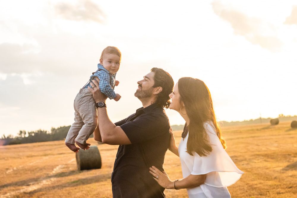 family portrait in a field in Cartersville Georiga