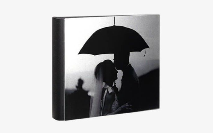Elegant metal cover album with a reinforced spine and personalized text
