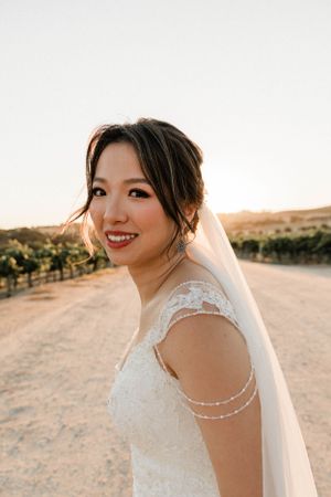 Asian bride smiles after getting married.