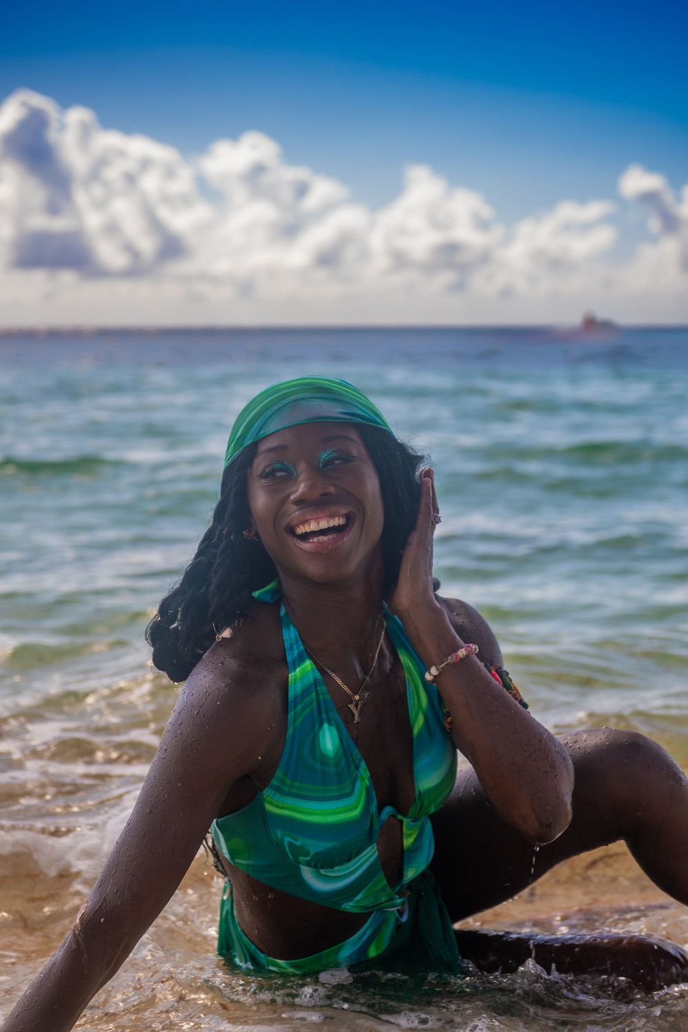 Candid lifestyle photo of woman walking barefoot on the beach