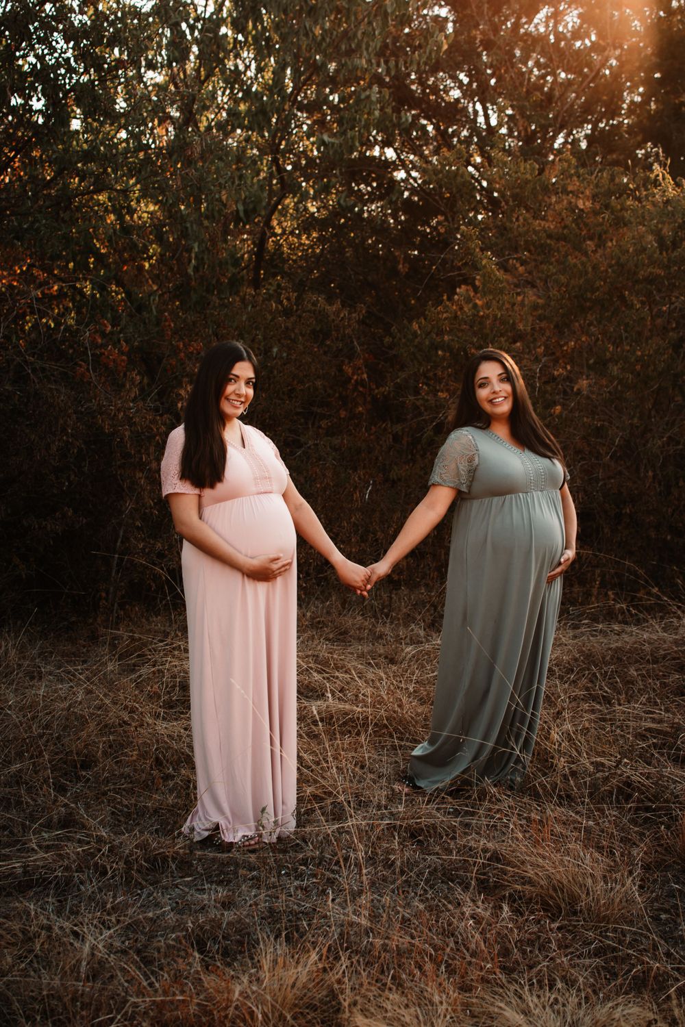 Sunrise maternity session at Northwest Community Park in DFW of twin sisters sharing their journey of pregnancy together
