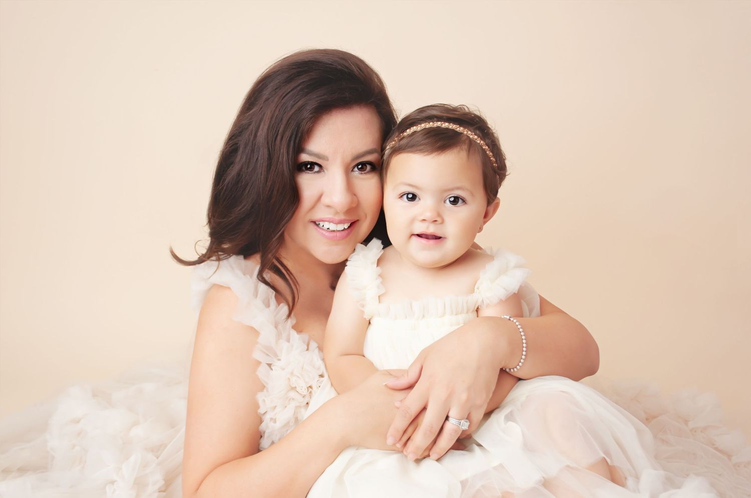 mommy and me 1 year milestone little girl with mom in cream ruffles
