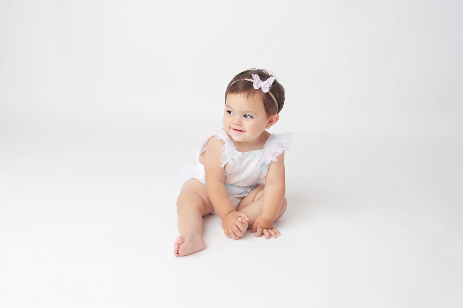 1 year milestone simple on white in butterfly outfit