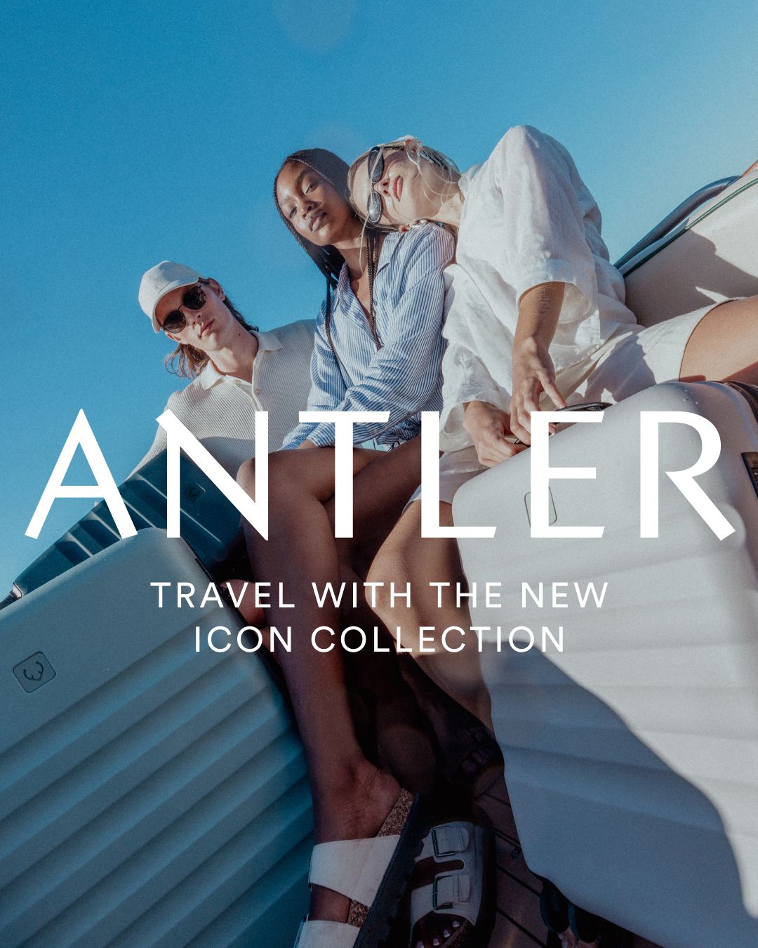Antler luggage advertisement featuring lifestyle shot on a boat with blue sky background.
