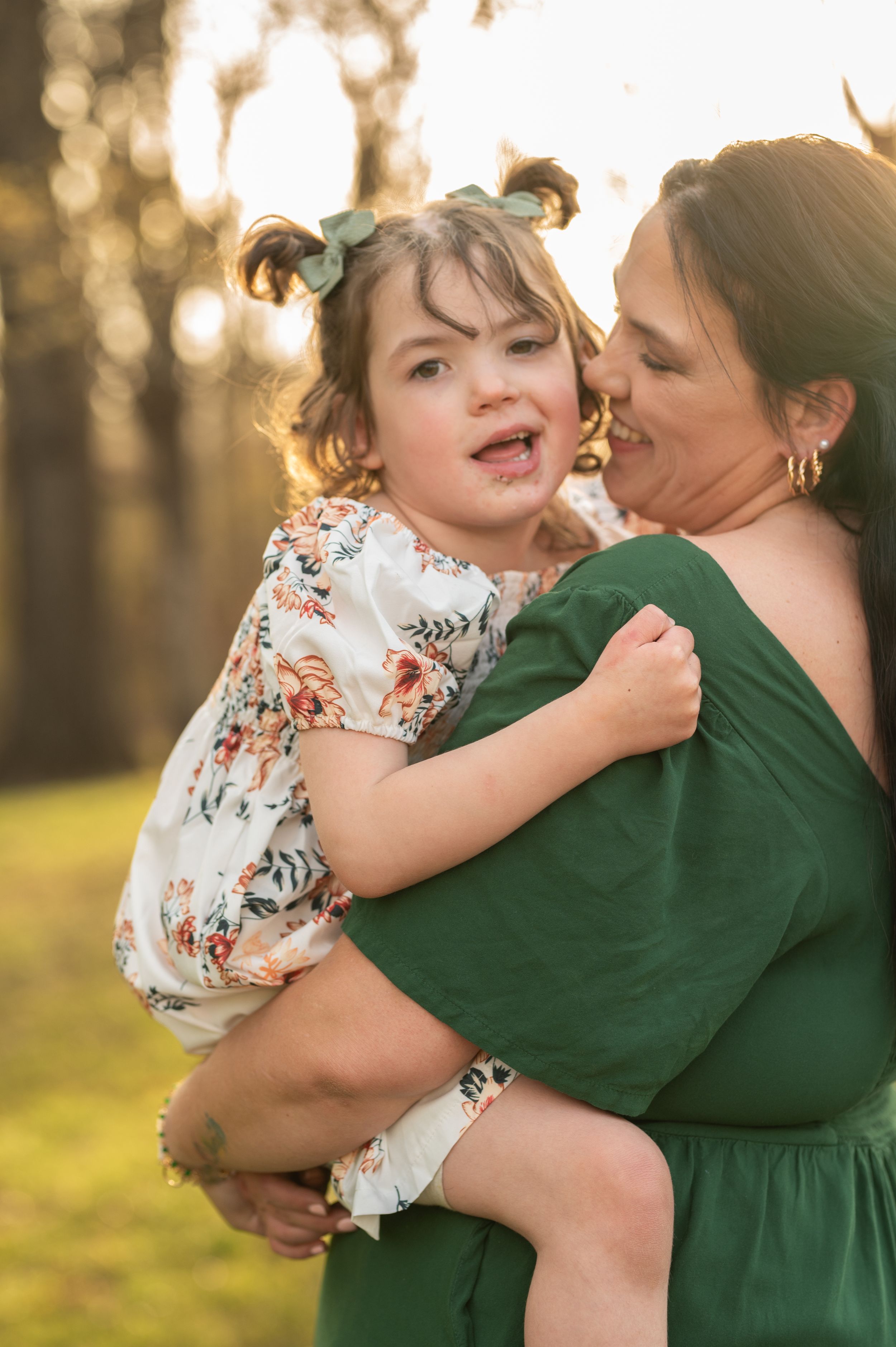 Heartwarming outdoor portrait showing genuine laughter and connection.