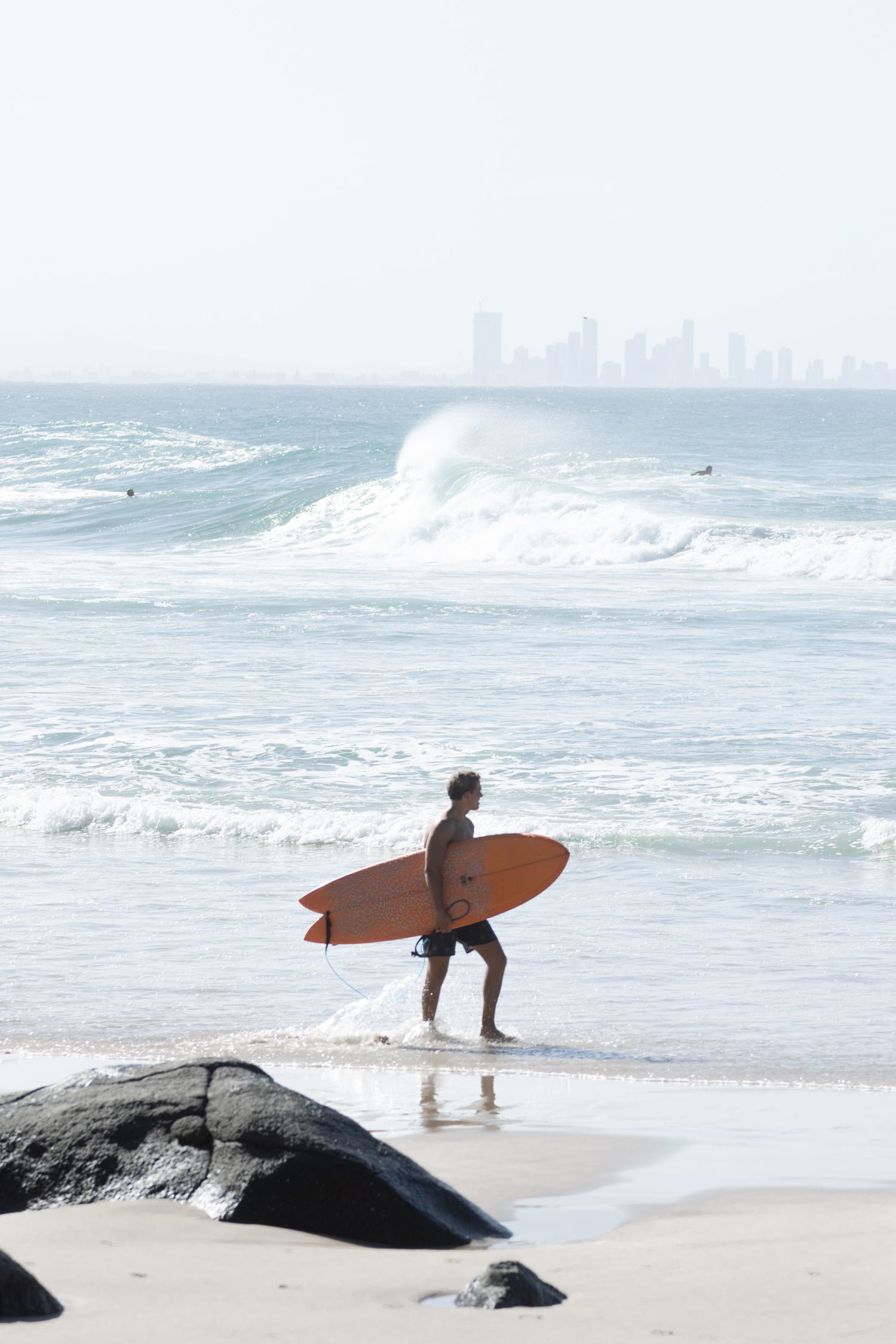 orange surfboard, surfer, Gold Coast photographer, surf shoot, beach, beach aesthetic, waves, water, sand, Australia