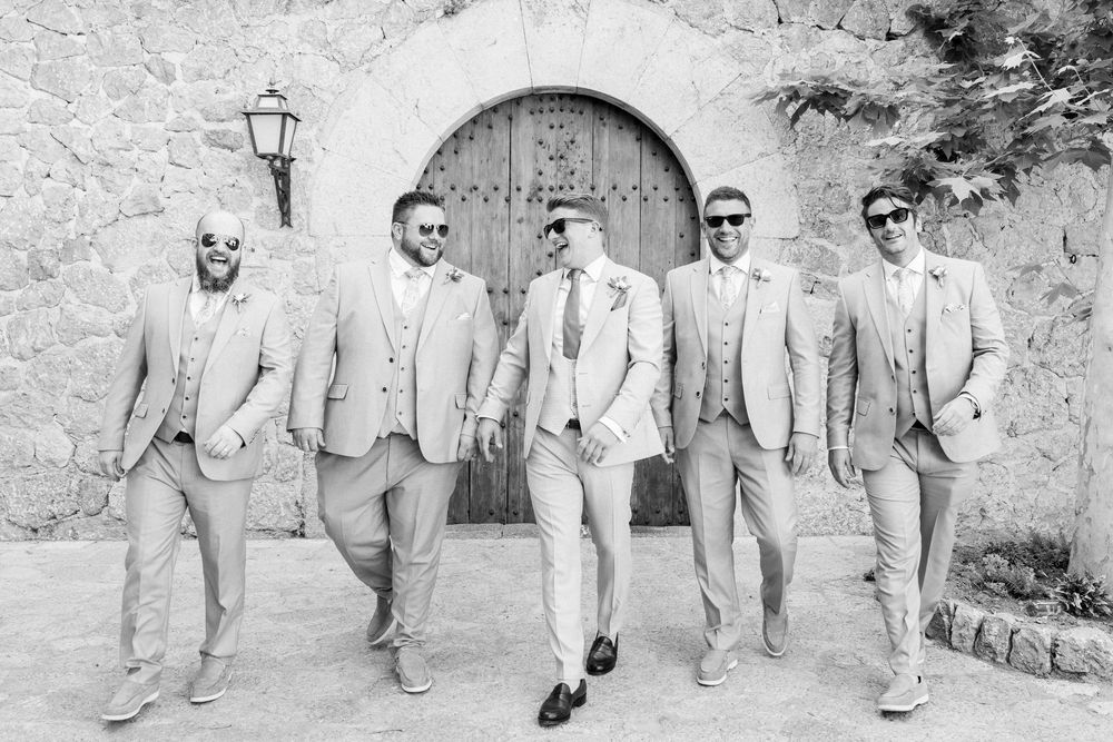 Multiple vintage photos show individuals in formal attire walking along a stone wall path at different angles.