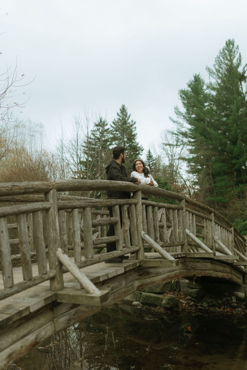 Romantic couple sharing a heartfelt moment in a beautiful outdoor setting.