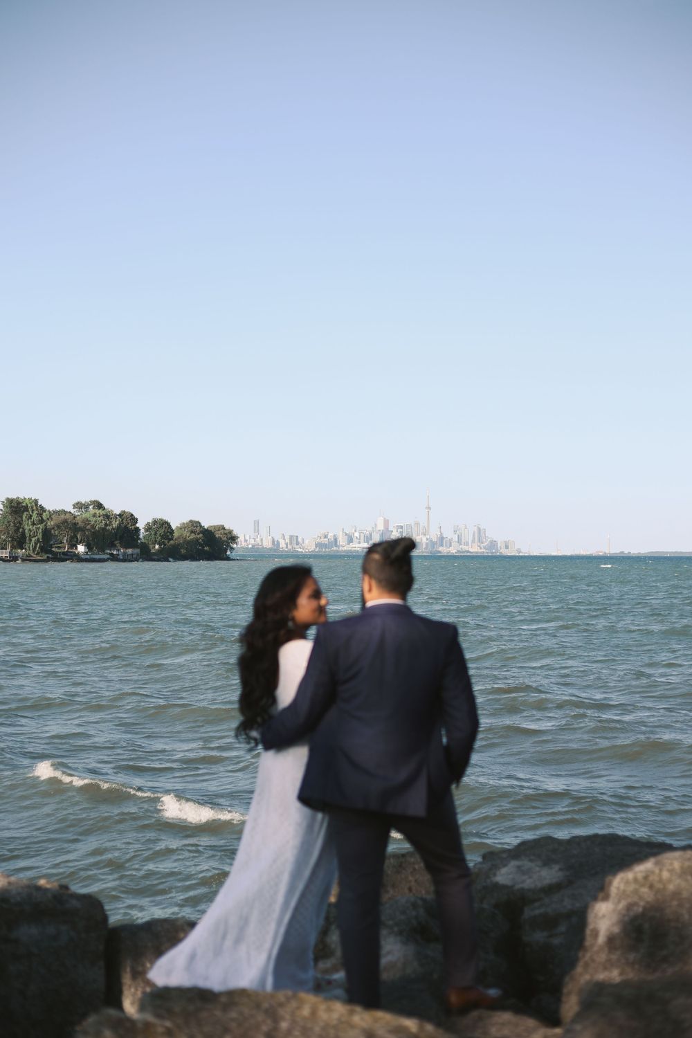 Romantic couple sharing a heartfelt moment in a beautiful outdoor setting.
