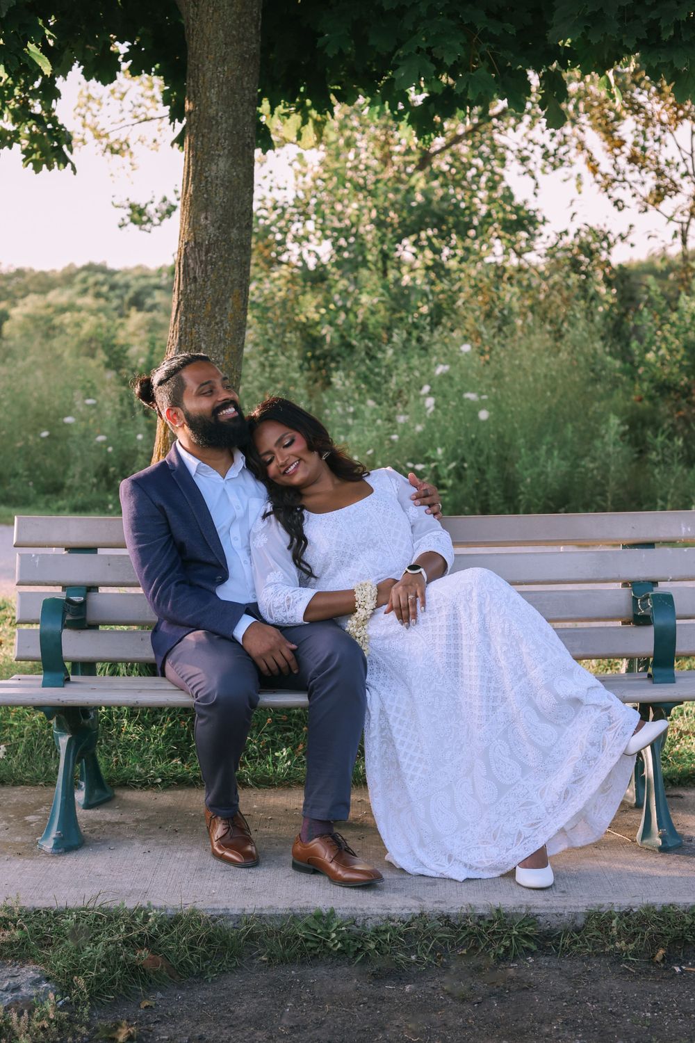 Romantic couple sharing a heartfelt moment in a beautiful outdoor setting.