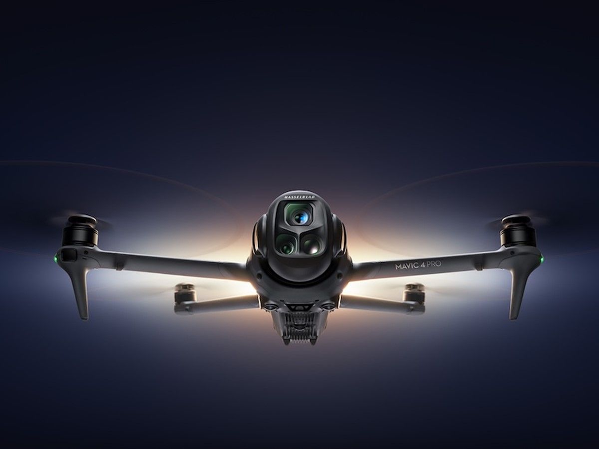 DJI Mavic drone camera closeup showing gimbal and lens system in profile view.