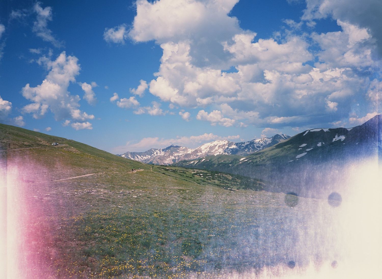 Film at 12,000 ft -- Rocky Mountain National Park. Bright sunny day and blue skies.