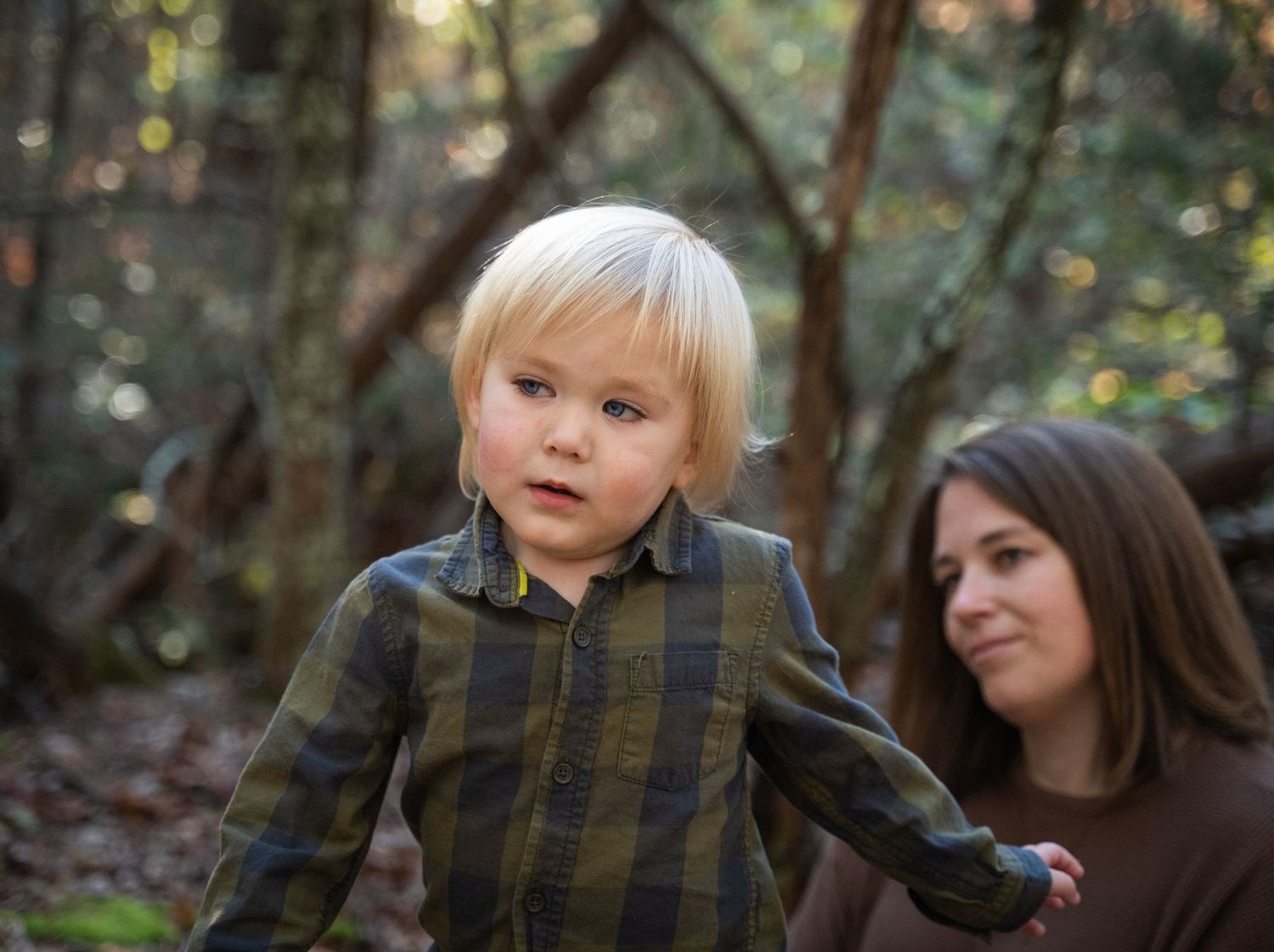 Mother and child in wooded setting in Landrum, South Carolina.