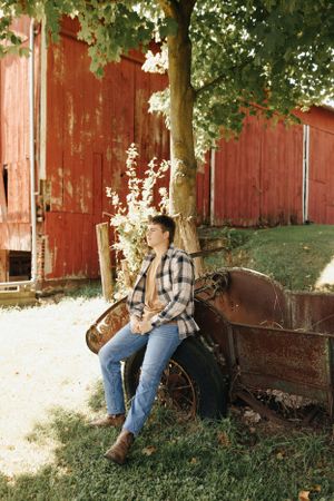 Senior photos of a Mansfield baseball player at his family farm.