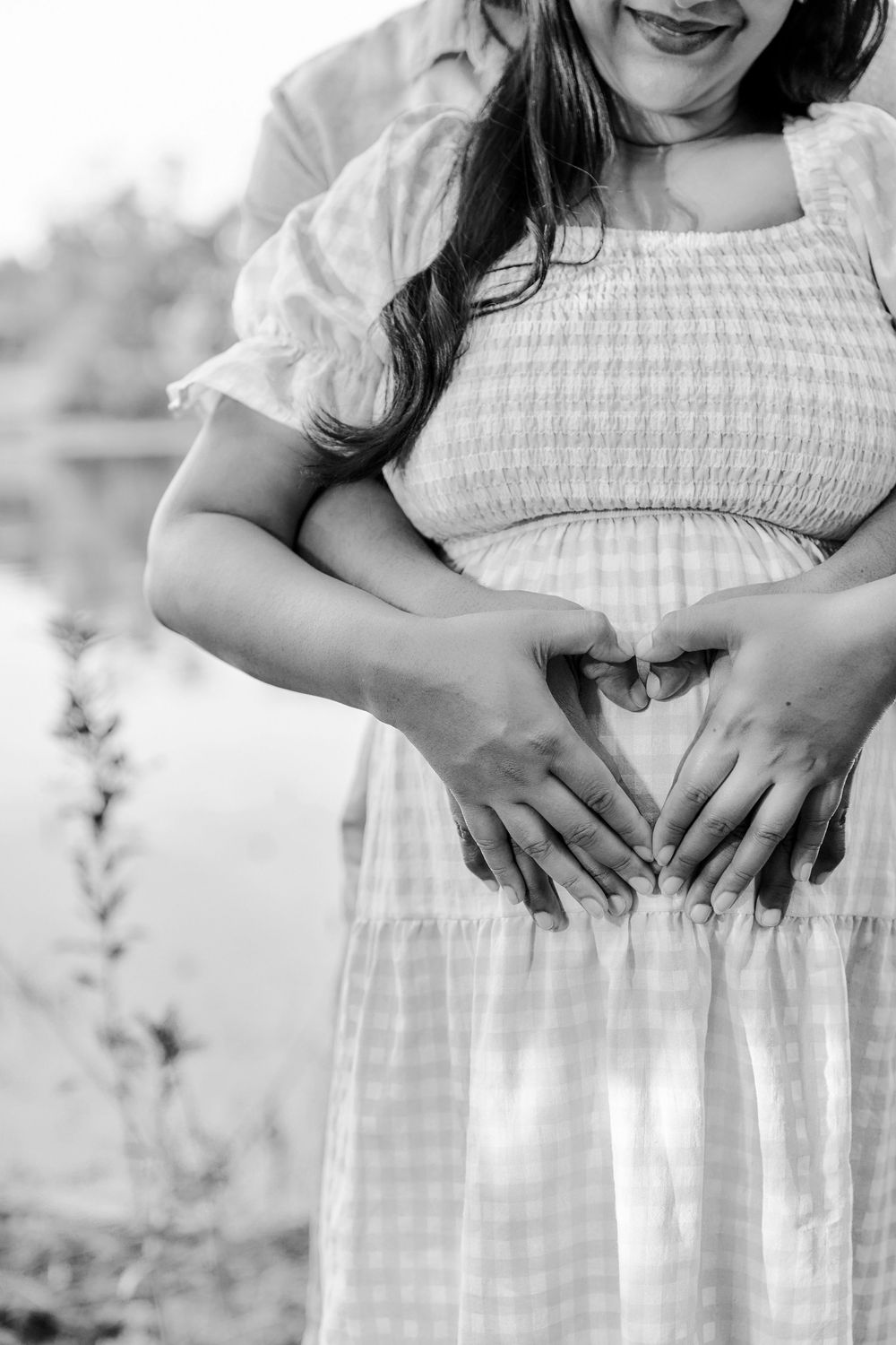 Black and white photo series showing close-up details of a white summer dress with delicate smocking and gingham pattern.