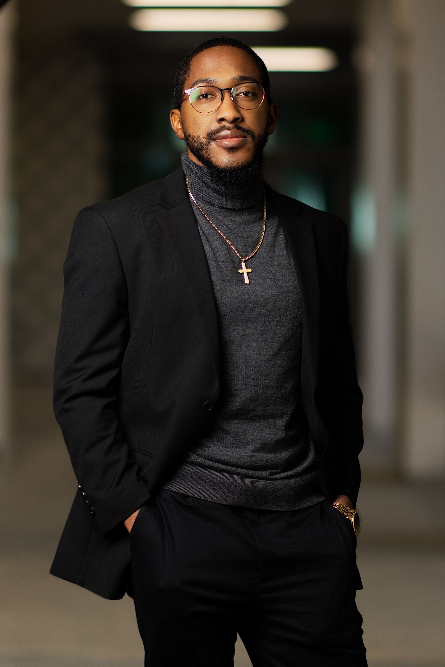 Personal branding photoshoot in Long Beach showing male entrepreneur in professional office setting by Justicee Photography