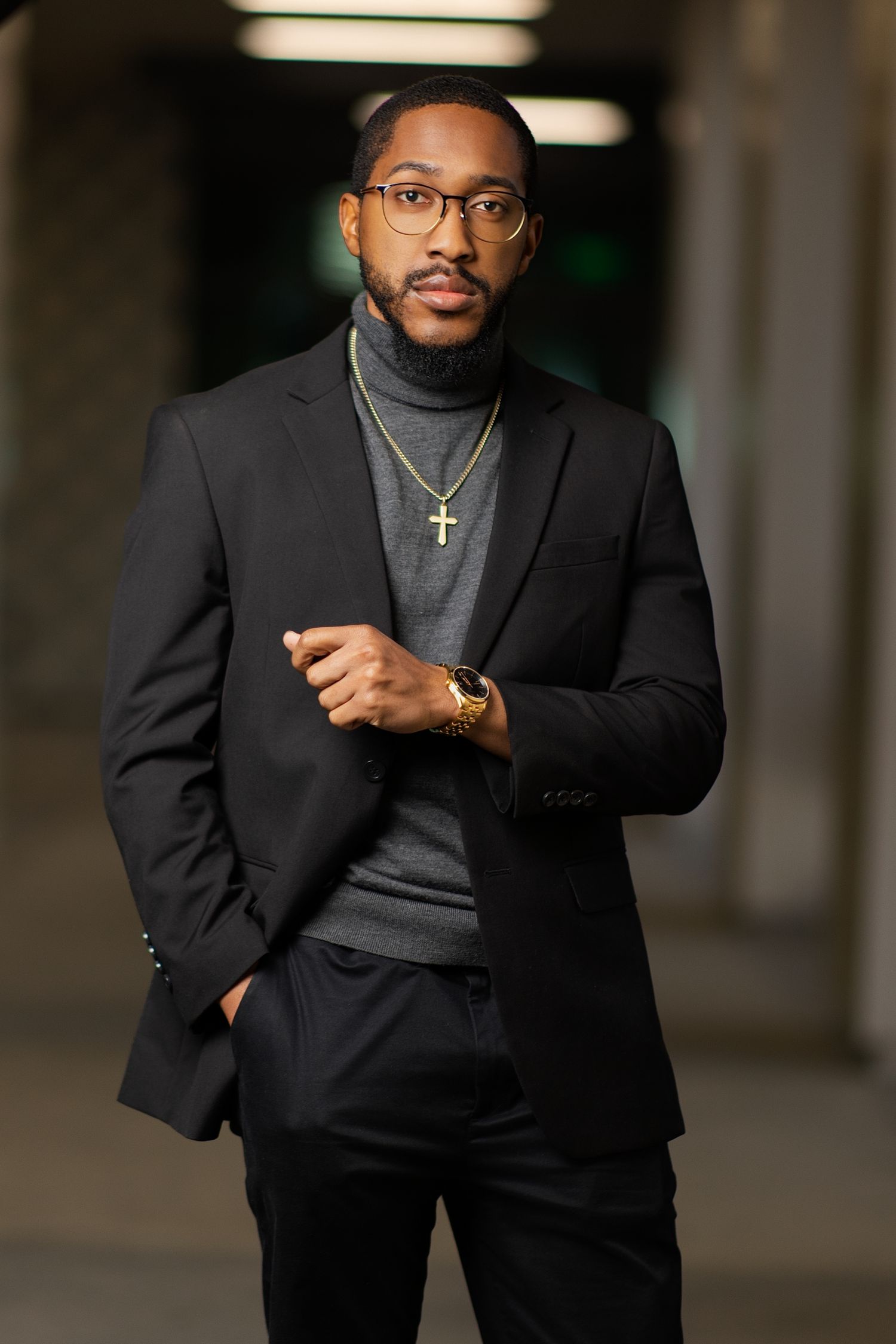 Personal branding photoshoot in Long Beach showing male entrepreneur in professional office setting by Justicee Photography