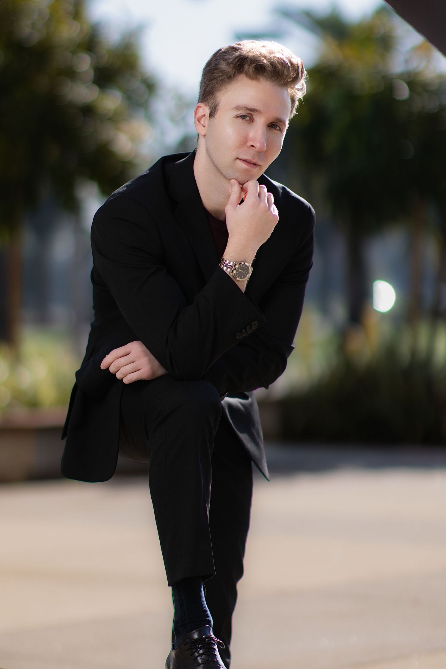 Personal branding photoshoot in Long Beach showing male entrepreneur in professional office setting by Justicee Photography