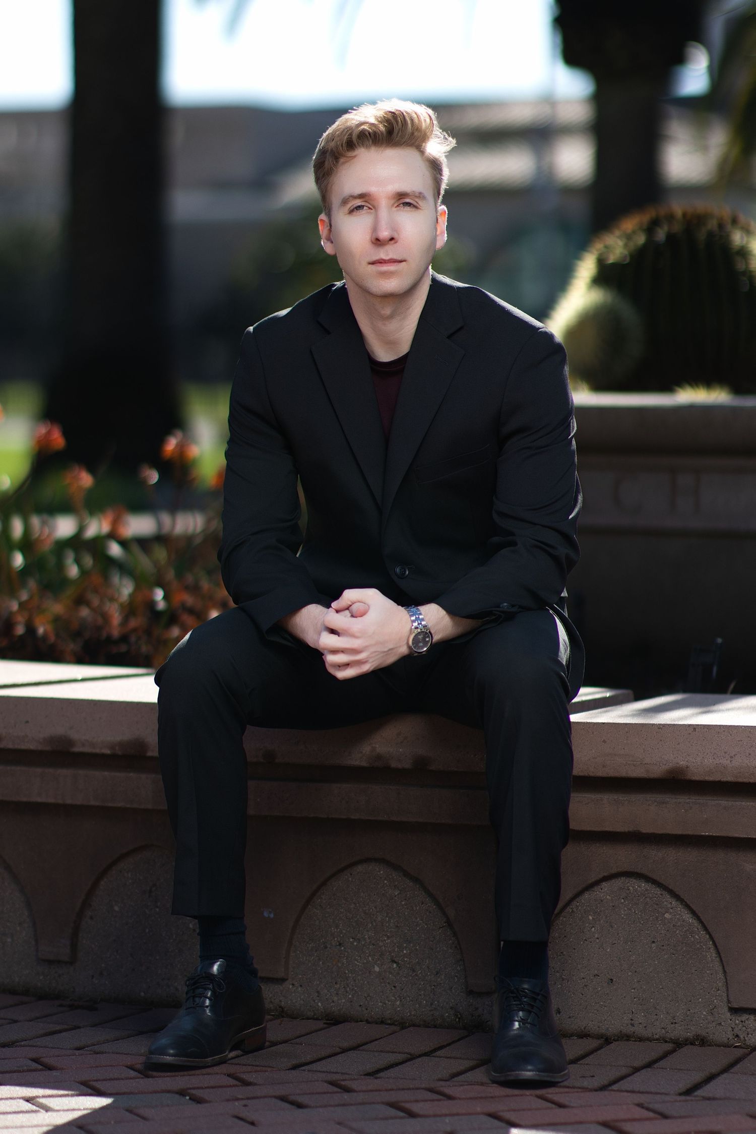 Personal branding photoshoot in Long Beach showing male entrepreneur in professional office setting by Justicee Photography