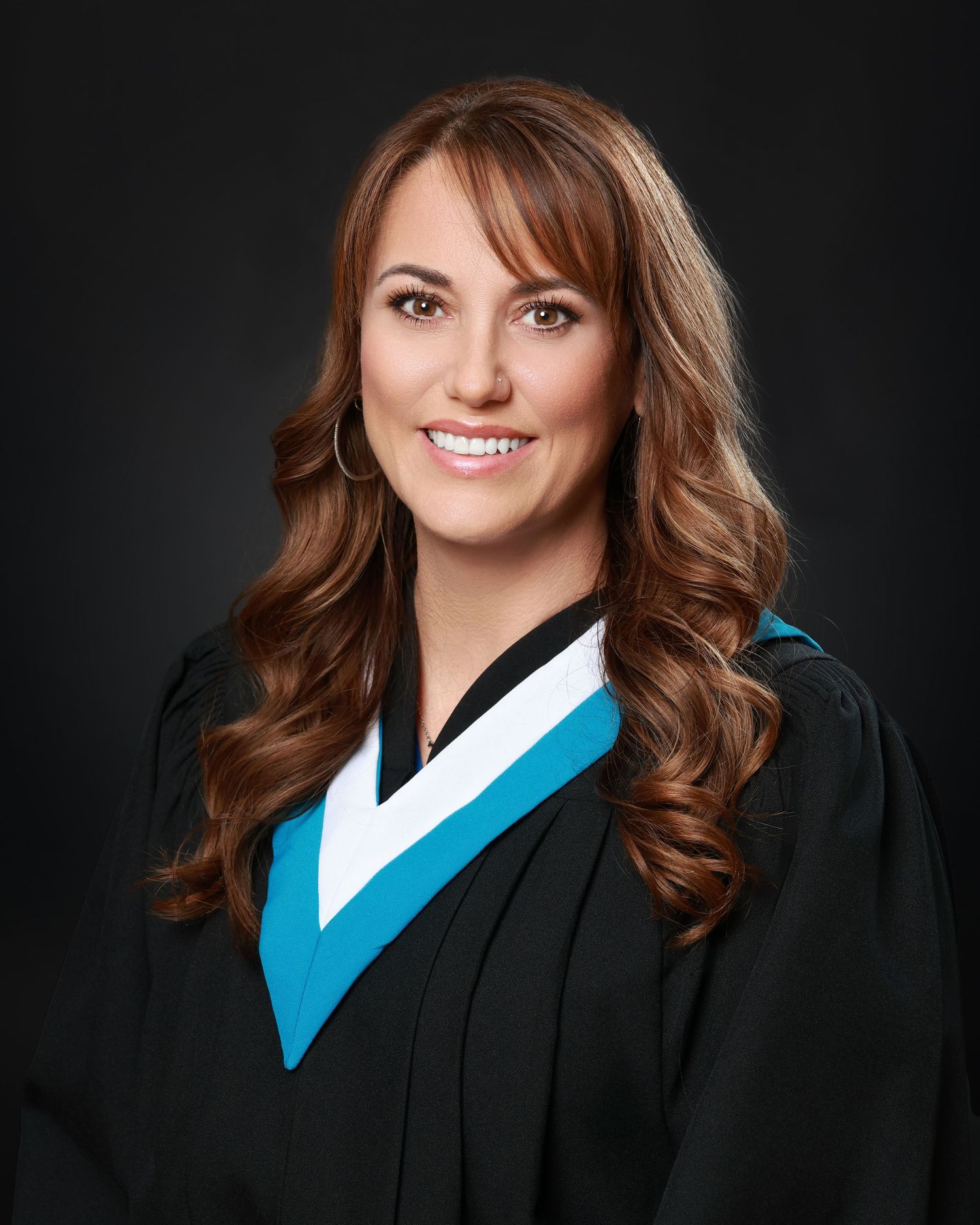 Senior Grad photo with traditional pose and clean backdrop