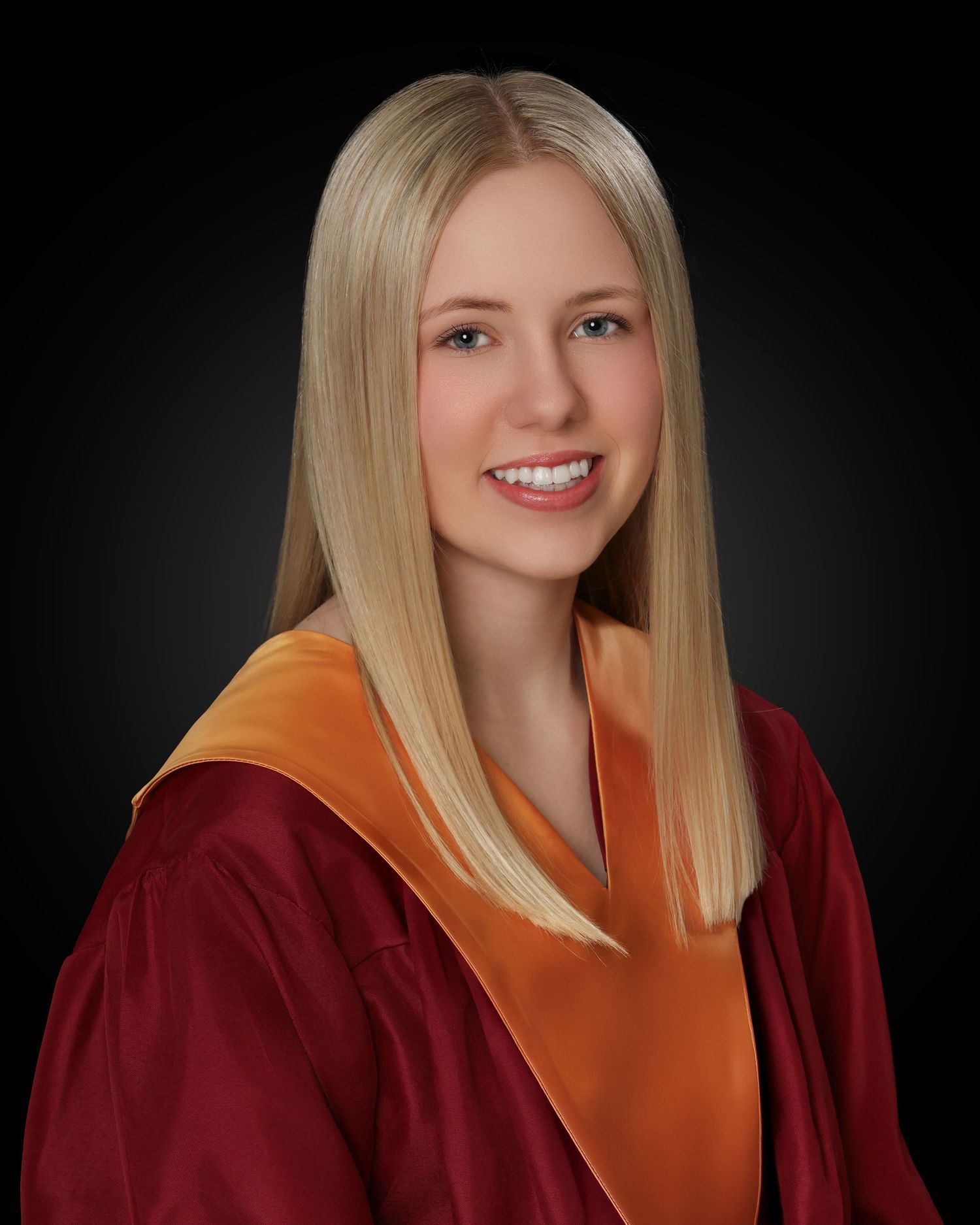 Senior Grad photo with traditional pose and clean backdrop