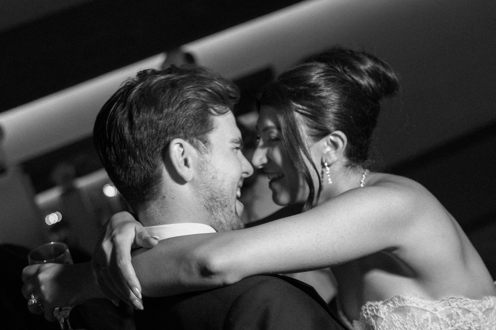 A romantic dance between a couple at their wedding celebration.