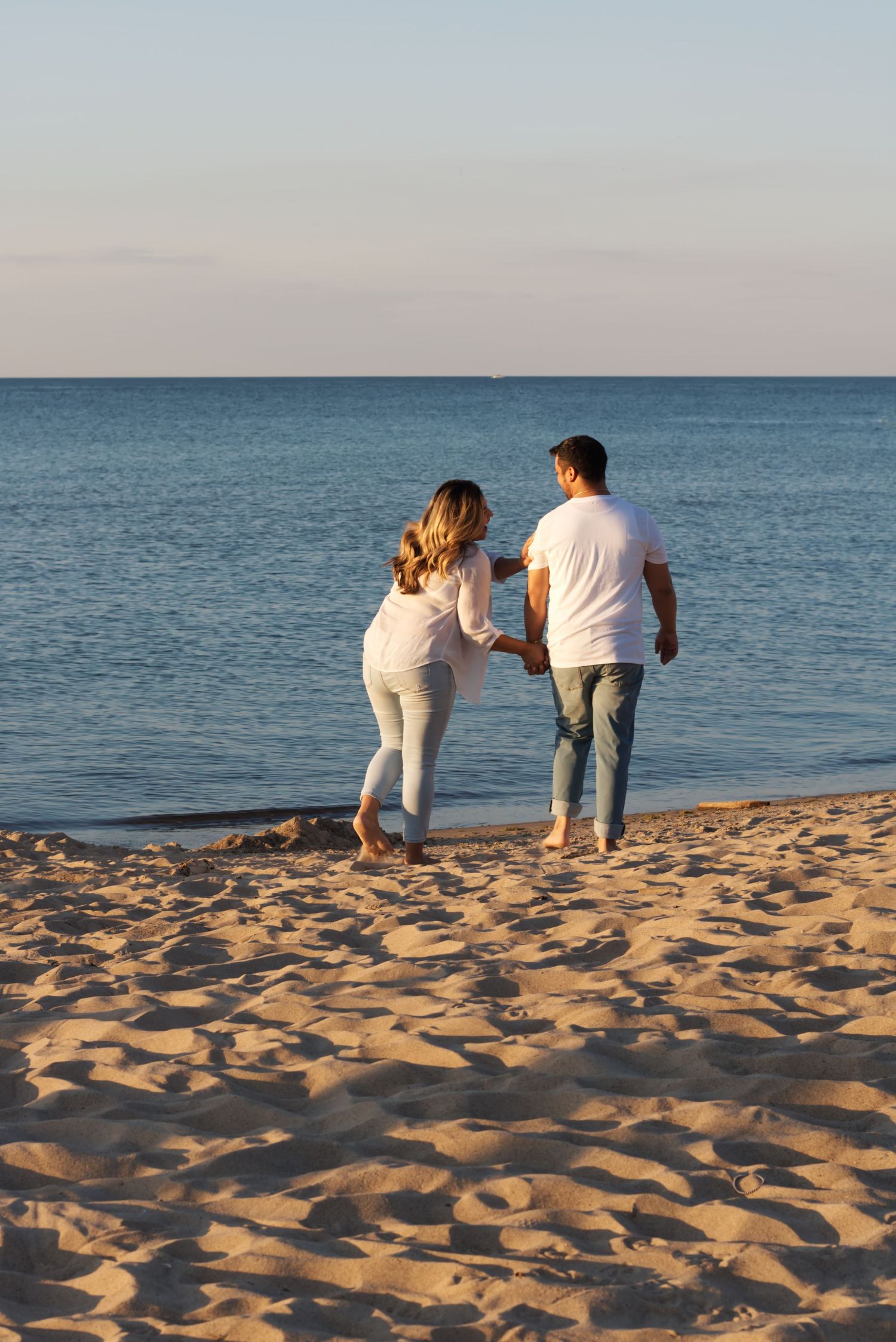 A couple walking on the beach