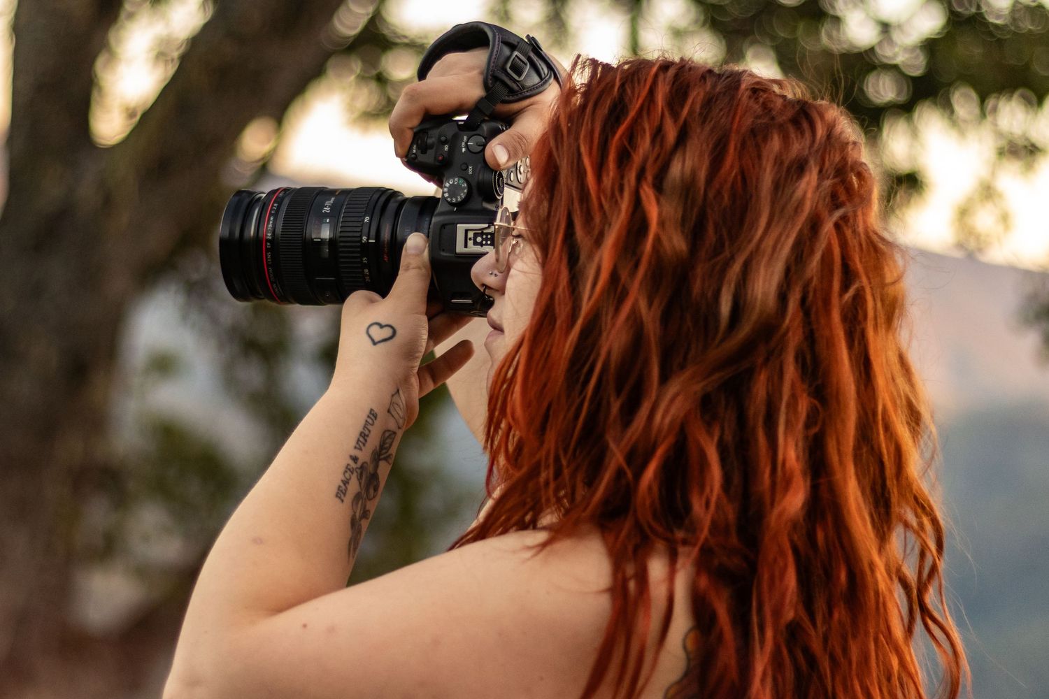Portrait of Bo K Photography owner, Autumn Kennelly in the mountainside. Photographed by Buckskin Beauty Photography.