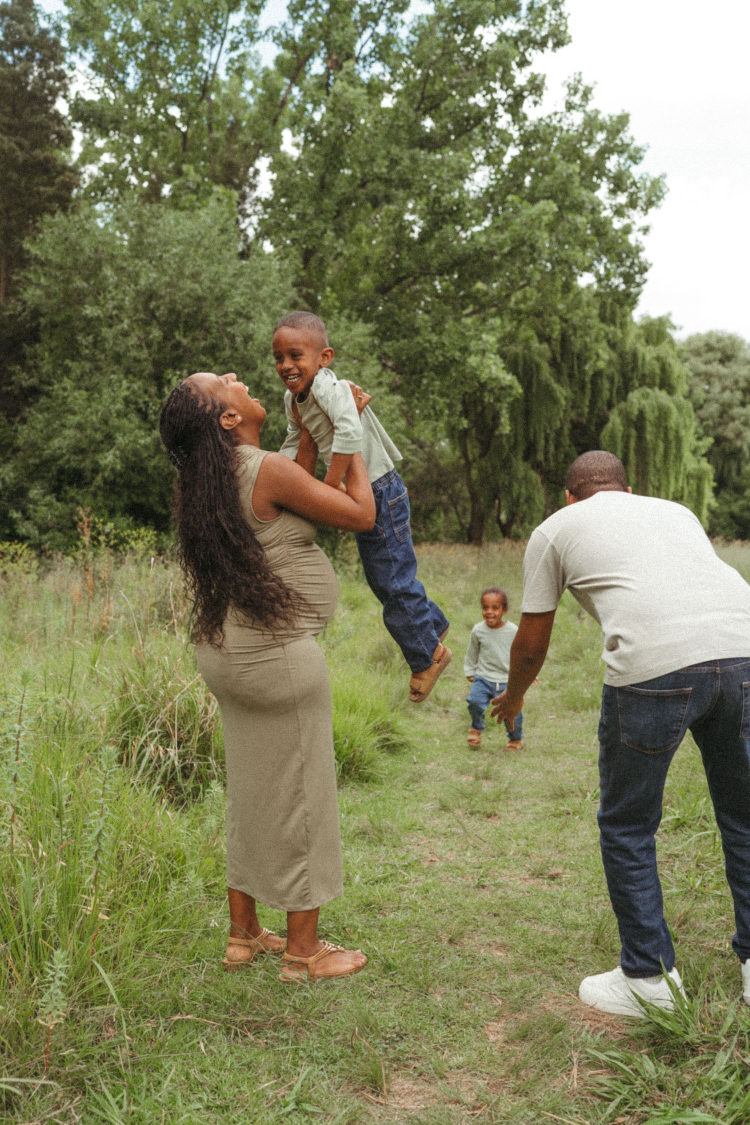 Candid shots of family members interacting in a wildflower field.