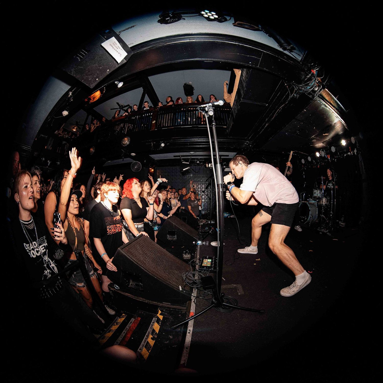 Fisheye picture of Jack Underkofler of Dead Poet Society singing at Subterranean in Chicago.