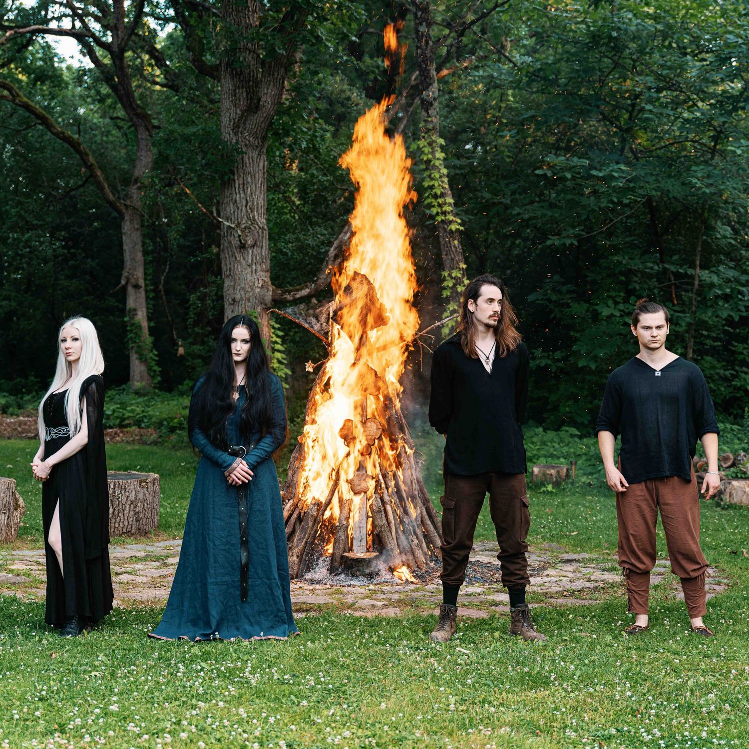 Picture of Exire in front of bonfire.