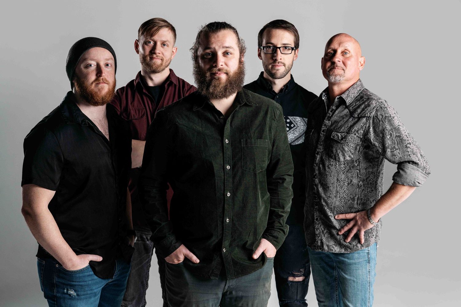 Studio promotional picture of Sons of Sconnie.