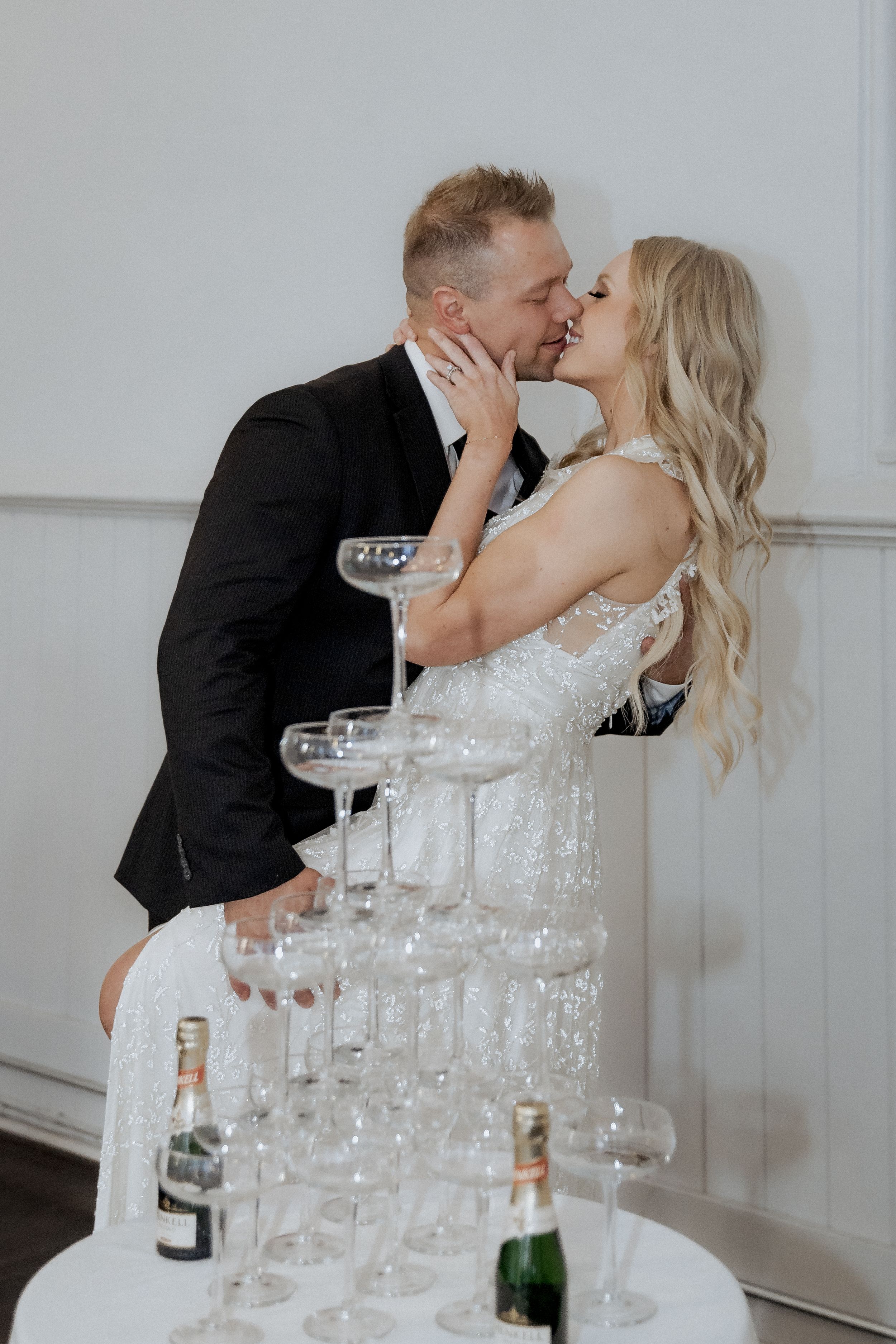 wedding reception photography flash portraits champagne tower film documentary style wedding photos Moncton New Brunswick Halifax elopement
