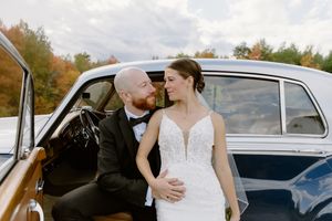 bride and groom portraits with antique car, classic wedding photography Moncton New Brunswick, vintage car wedding photos fall wedding