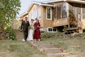 bride and parents walk down the aisle at intimate outdoor fall wedding in Hillsborough New Brunswick, Farmer Brown's greenhouse wedding