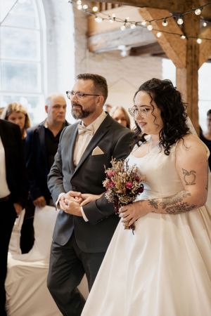 Bride and her father walking down the aisle in St. Pats Church Museum, Cape Breton wedding photographer, intimate micro-wedding Nova Scotia