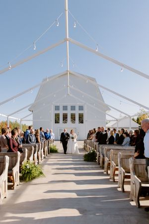 bride and her father walk down the aisle outdoor fall wedding ceremony at the Grand Ivory, Moncton wedding photographer luxury upscale photo
