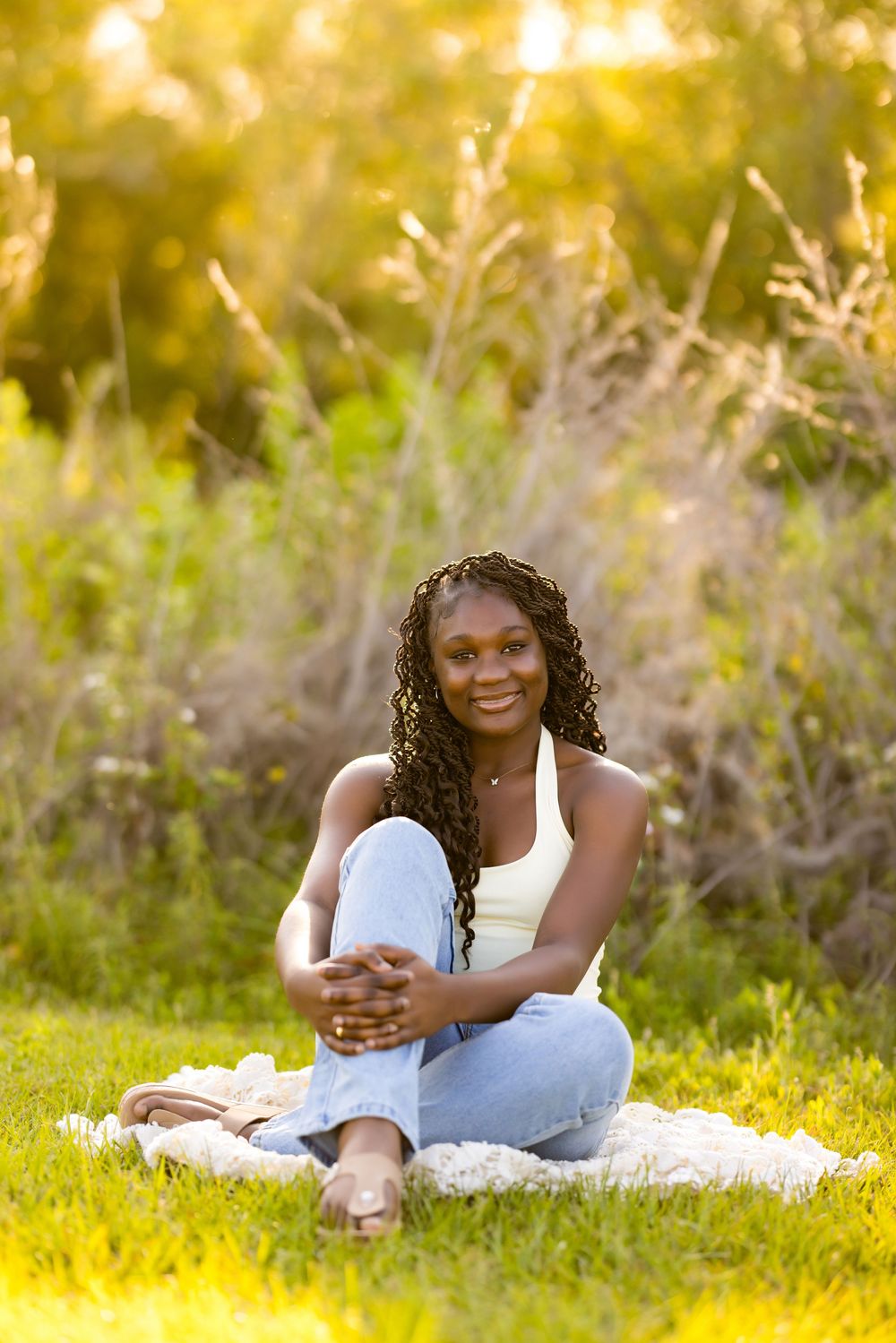 A relaxed outdoor portrait sitting on a blanket in the golden evening light. Photos by Tampa Photographer DigitalMyst Photography