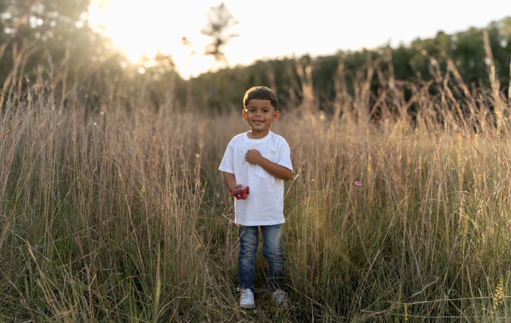 Aesthetic portrait of a child in a field