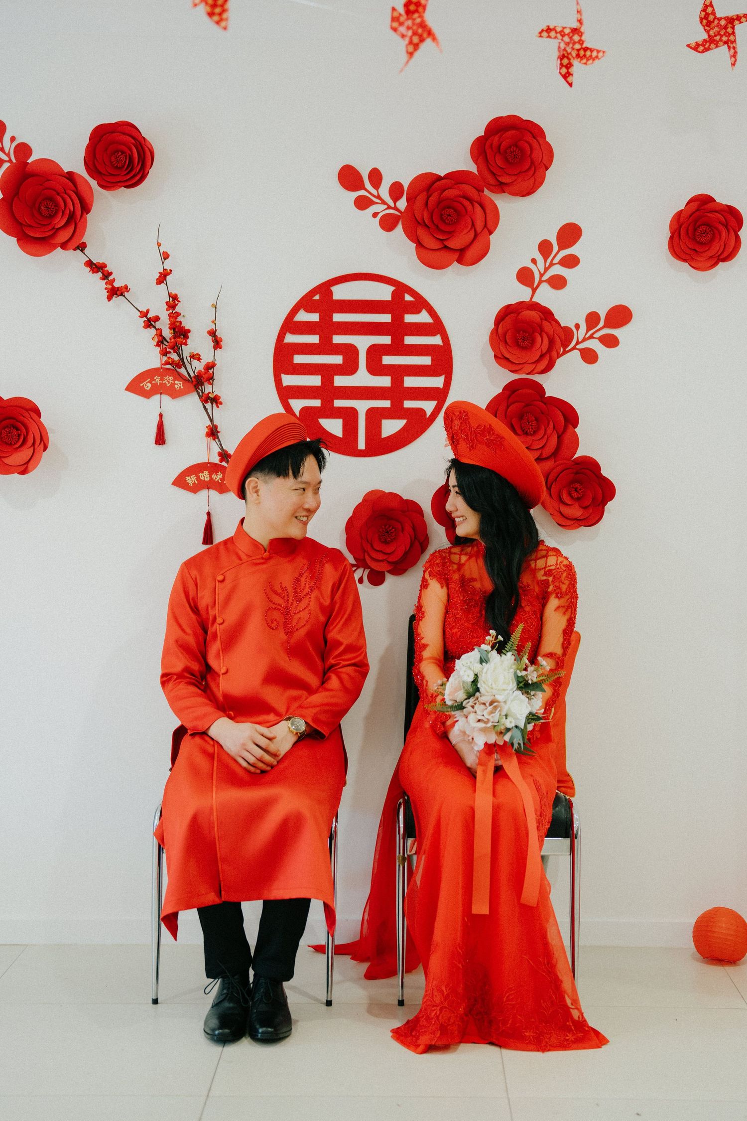 Tea ceremony at wedding with bride and groom in traditional attire in Brisbne wedding photography